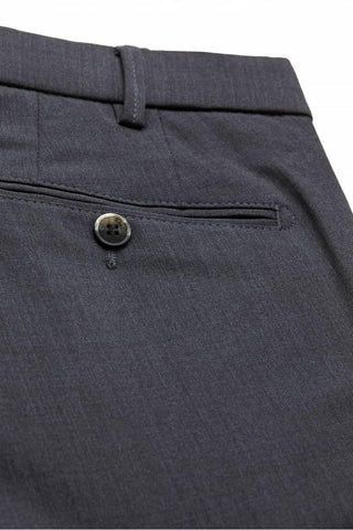 Close-up of dark grey lightweight wool dress pants with buttoned back pocket