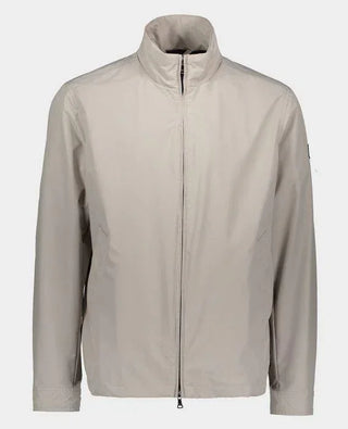 Men's light beige nylon jacket with full zip front and stand collar, minimalist design