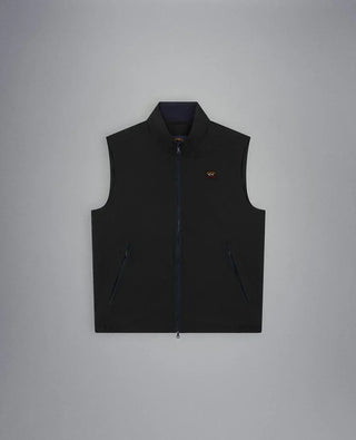 Men's navy blue nylon sleeveless vest with zipper and subtle chest logo on gray background