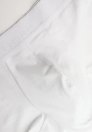 Close-up of white men's boxer briefs with soft waistband and smooth cotton fabric