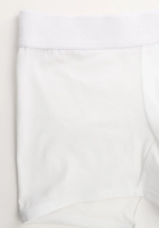 White men's boxer briefs with wide elastic waistband on plain background