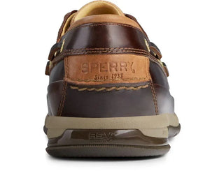 Rear view of a Sperry brown leather men's boat shoe with visible stitching and logo